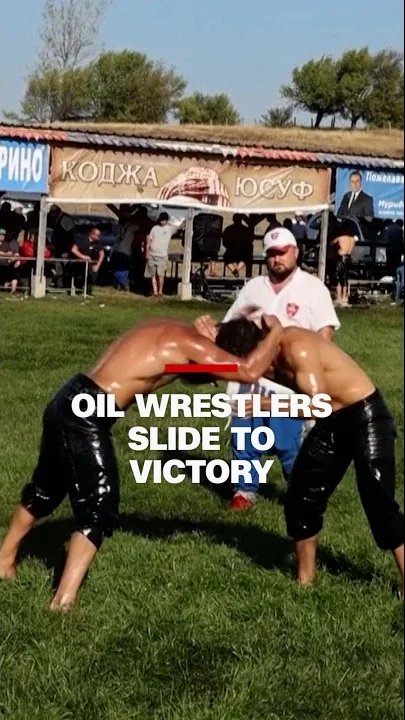 Watch: Oil wrestlers slide to victory