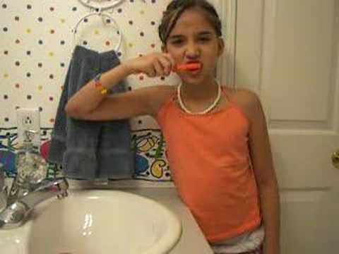 Julie brushes her teeth when she feels emo