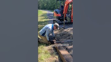 Een grindpad repareren #hack #oprit #graafmachine