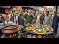 70/- Rs MAKKI ROTI WITH SAAG ON GIANT TAWA DESI NASHTA IN PAKISTAN | PAKISTANI BREAKFAST STREET FOOD