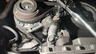 Loosen tensioner pulley on E39 M5