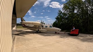 Pushing Mitsubishi Mu2 into the hangar with the zero turn Hammonds ODV aircraft tug.