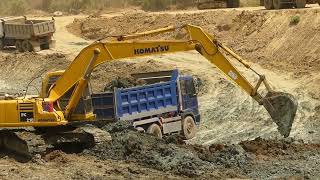 Dump truck go back to delivery land excavator loading construction clear mud