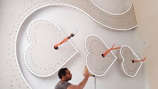 Изогнутый дизайн потолка из гипсокартона
