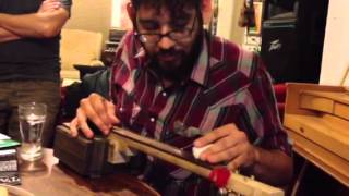 Lucas Gorham plays cigar box guitar built by Marcus Hughes Content