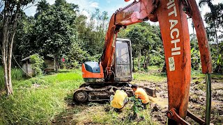 Repair the mini excavator track, hydraulic leak and use it to clear a land slide on road