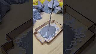Pouring Concrete Into This Tiny Form Gets Messy