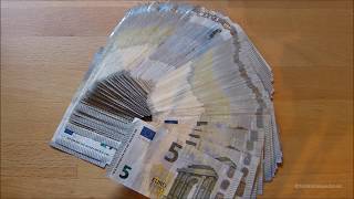 Counting Stack Of 5 Euro Banknotes