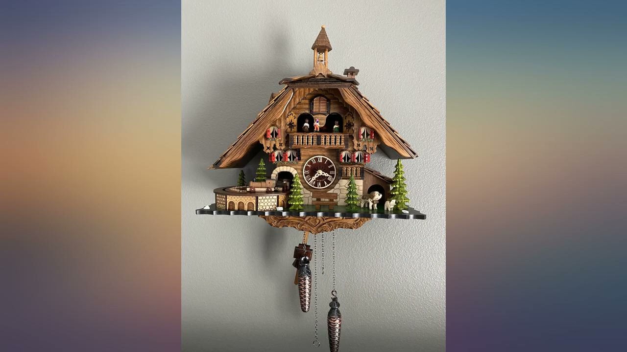 Quartz Cuckoo Clock Black Forest House with Moving Train, with Music EN 48110 QMT review
