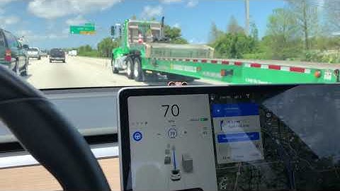 Tesla Model 3 Changing Lanes by Itself on Freeway