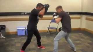 Nicky Byrne on the pads with WBC Champ Wayne McCullough