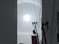 Rainbow elliptical halo around the sun in india