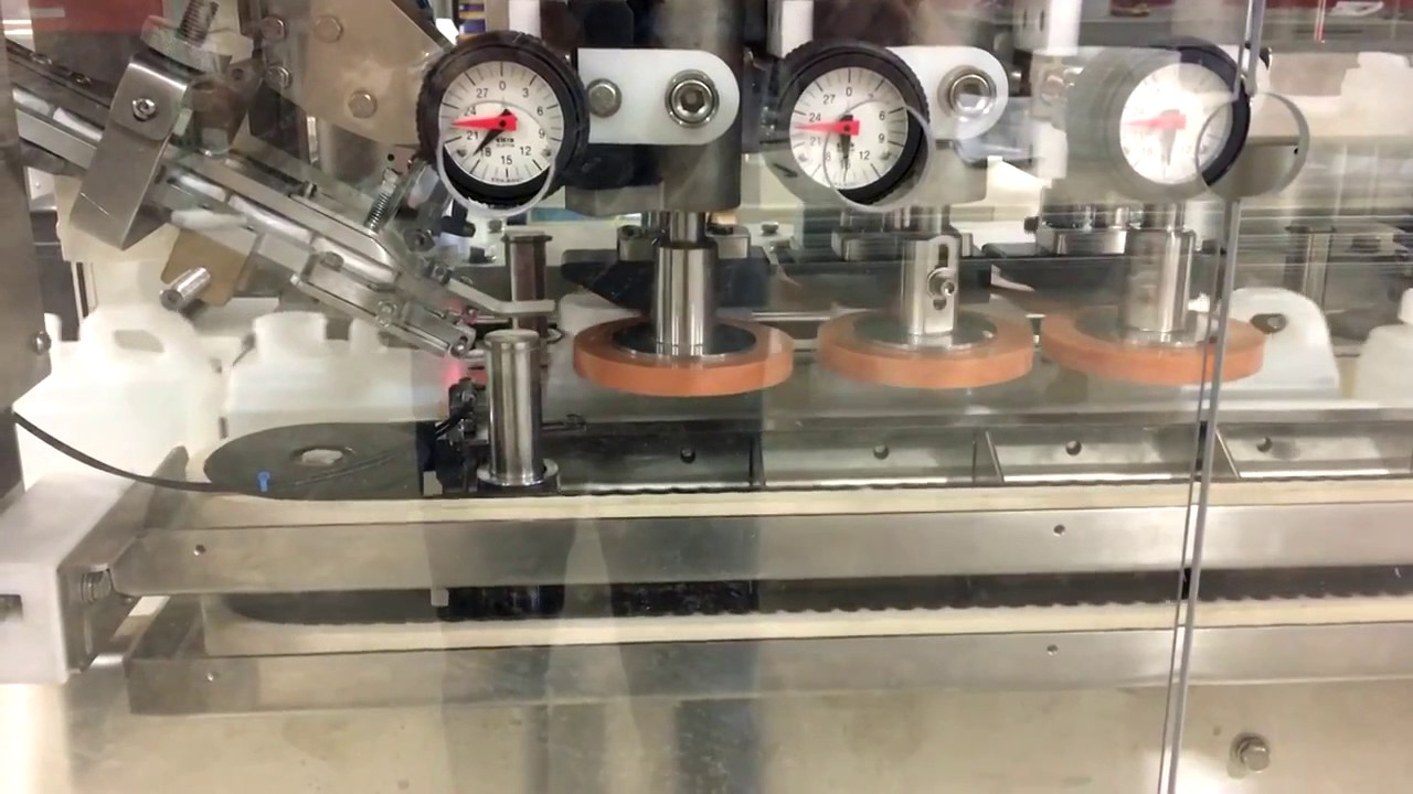 Automatic Inline Bottle Capping Machine Model TruCap X Vert - YouTube