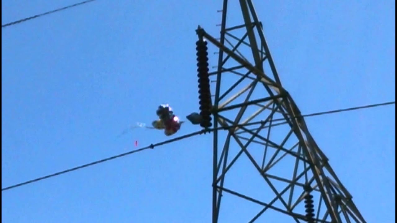 Mylar balloons on 230kV power lines - YouTube