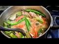 Sinigang  tamarind soup with pork and vegetables  pork neck and kale