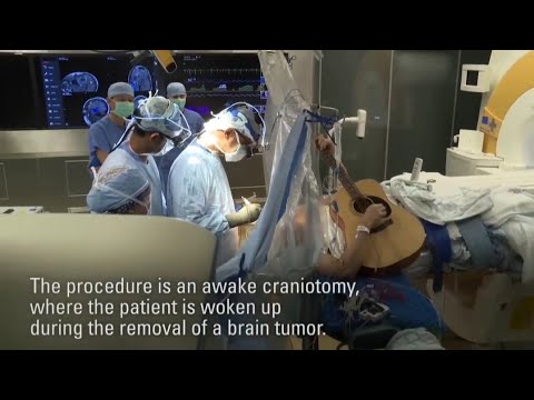 Brain tumor patients play guitar during surgery 🎸