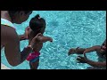 Mom throws 9 month old baby in the pool to swim