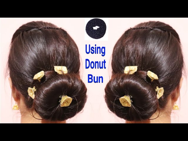 Simple messy bun hairstyle in focus of bollywood actress hema malini with a  , side view, beautiful bun, hyper realistic , extremely realistic hair,  dslr, hd, 4k, extremely details, intricate details, bun