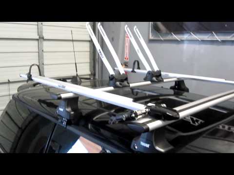 mini-cooper-with-complete-thule-roof-rack-system-for-two-bikes-by-rack-outfitters