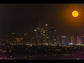 Full Hunter&#39;s Moonrise Over Downtown Los Angeles