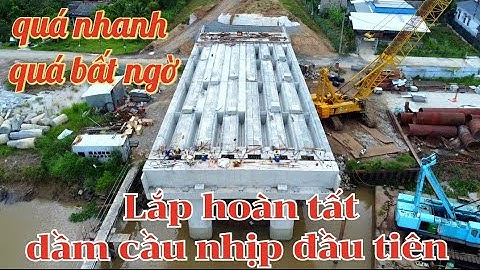 Cầu Rạch Miễu 2 nhịp phụ sông Mỹ Tho đã lắp dầm cầu hoàn tất 1 nhịp bờ Bến Tre / cầu rạch miễu 2