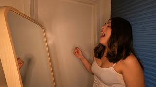 Girl Spraying Sneezes On A Mirror