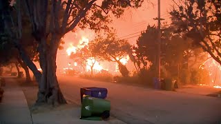 Chaos in Southern California as wildfires force mass evacuations