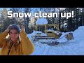Effortless winter cleanup pushing snow with a dozer