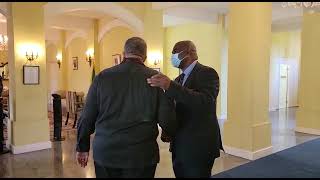 Phillips signs condolence book for the Queen