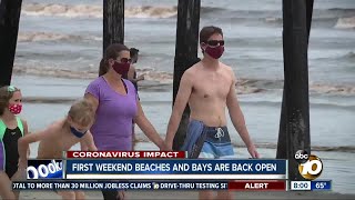 San diego is asking residents to continue physical distancing and wear
facial coverings, as the first weekend beaches are open poses a big
test.