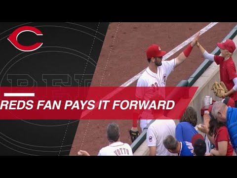 Reds fan pays it forward with foul ball