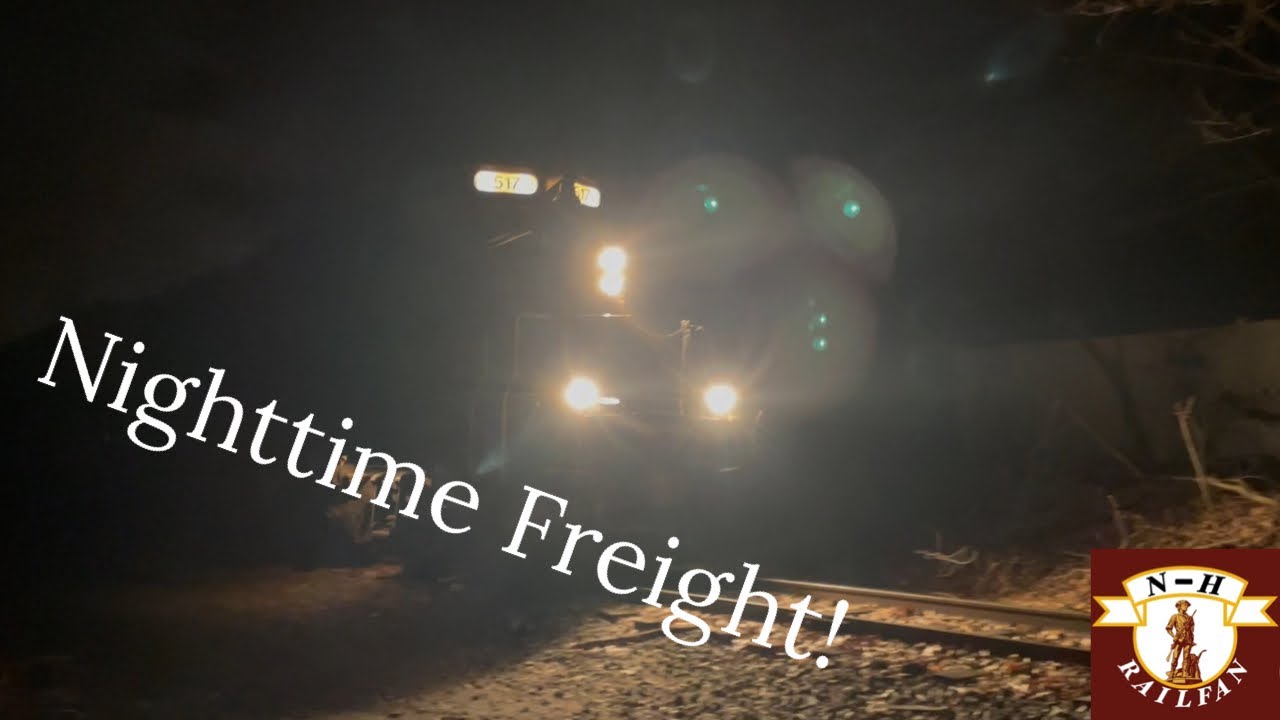 Pan Am Railways #517 hauls a night train to Bow NH