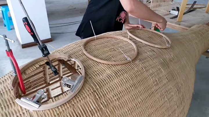 Lu Xu making Big Fish Bamboo Art in Guizhou, South...
