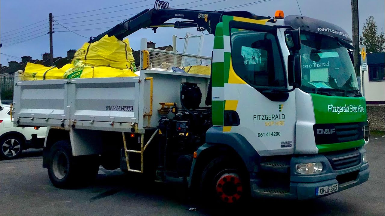 Fitzgerald Skip Hire Daf LF + Hiab crane collecting skip bag