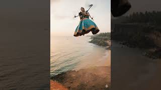 Woman Flying With Drone Over Ocean #illusion #tech