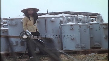 155mm Howitzer shells stacked in a US Army ammunition dump at Long Binh,Vietnam. HD Stock Footage