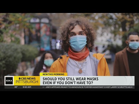 Video: Behøver vi stadig at bære masker offentligt?