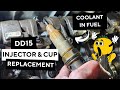 Replacing dd15 injector injector cup and passthrough line to fix coolant in fuel issues