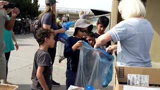 Harrison Family Helping Otter Outreach with Beach Clean Up