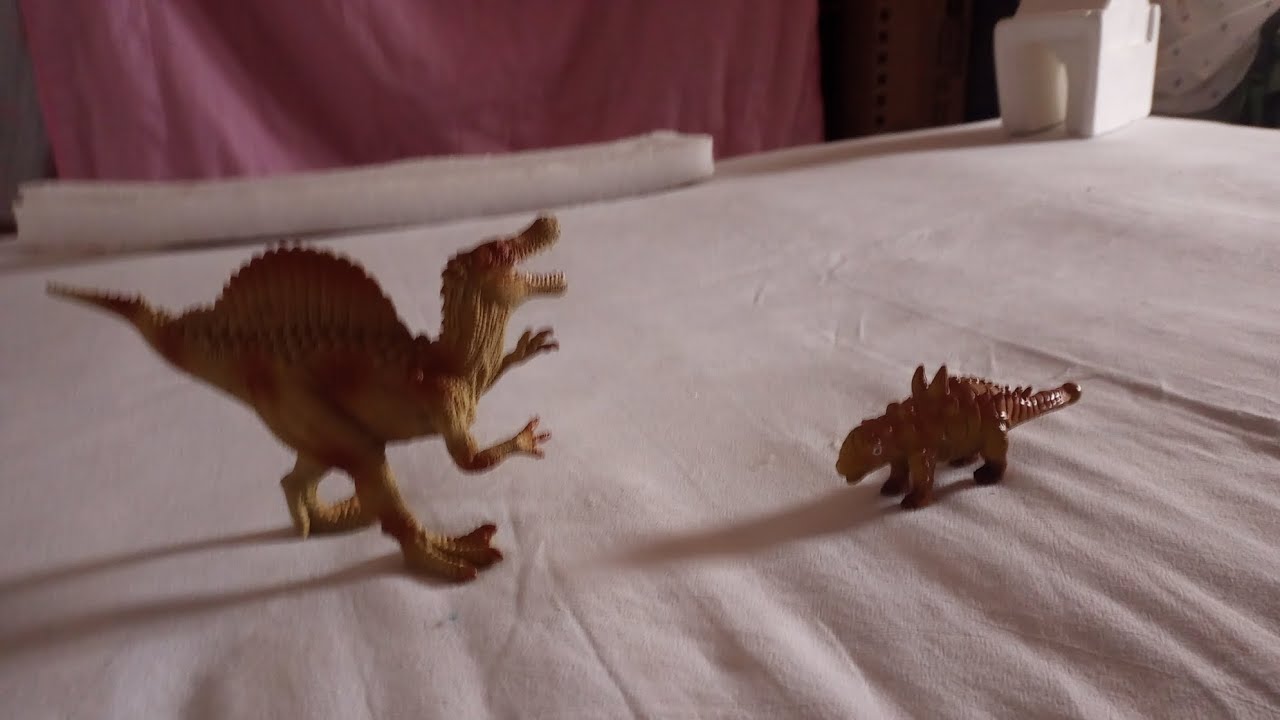 dino Battle 14 XD espinosaurio vs euplocephalus