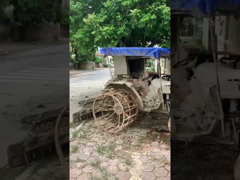 X2 Kubota tractors ?? in street - Chi Linh, Hai Duong