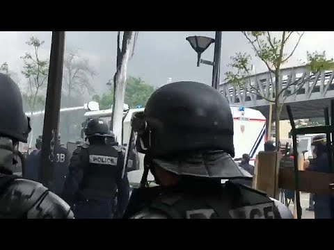 Anarchists crash May Day rally in Paris, burning cars and smashing shop windows