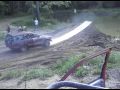 Jumping a toyota landcruiser into a pond then blowing it up twice