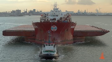 The arrival and discharging of 12 push barges onboard of the semi-submersible hawk
