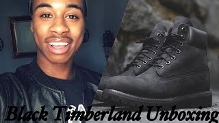 wearing black timberlands