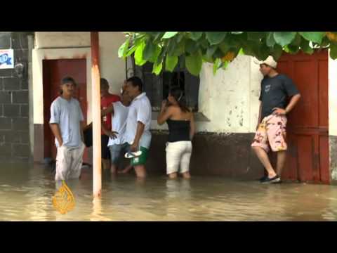 Guatemalans struggle to recover the dead buried by volcano eruption