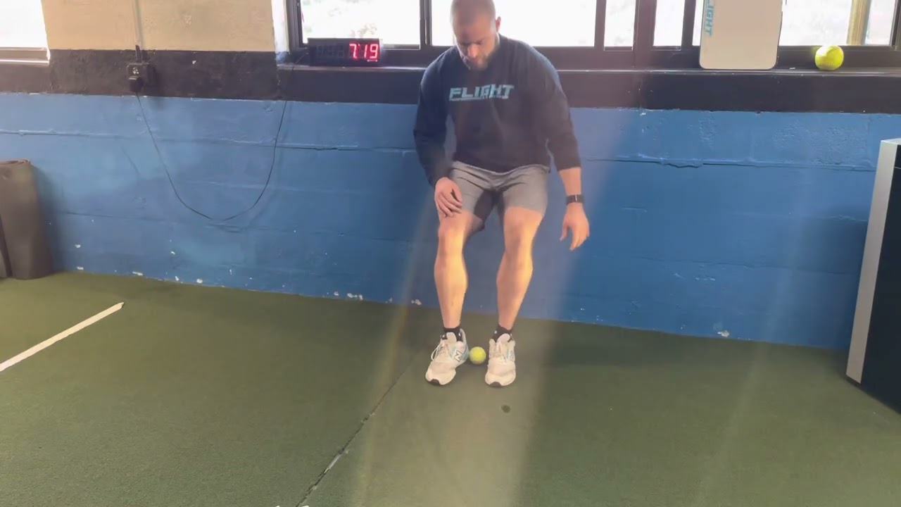 Wall Sit Calf Raise with Tennis Ball Between Heels - YouTube