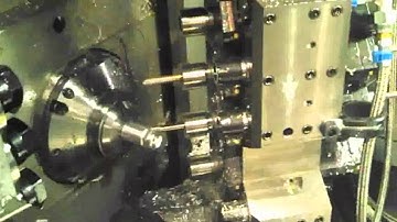 The Tsugami SS327-5AX machining a test part