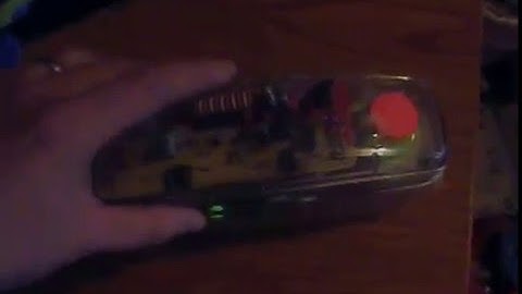 Vintage neon Conair transparent telephone demonstration