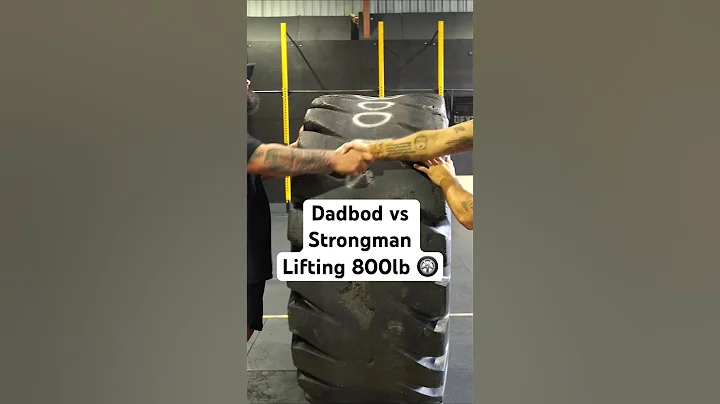 Dad bod va Strongman lifting 800lb tire